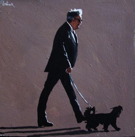 homme promenant son chien